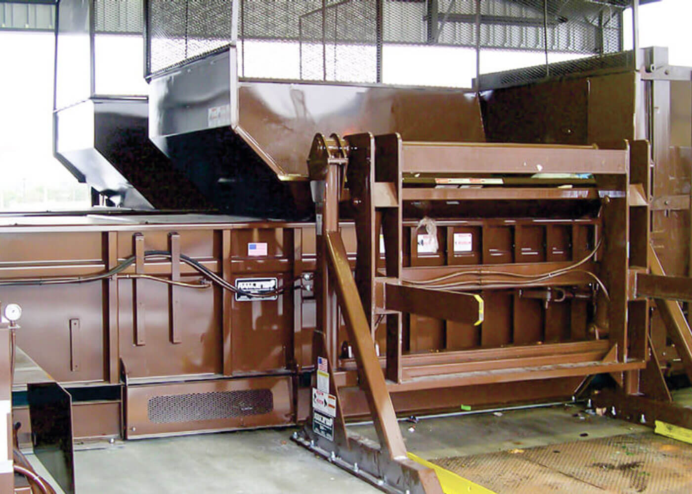 RJ-575 commercial stationary trash compactors with hydraulic lift